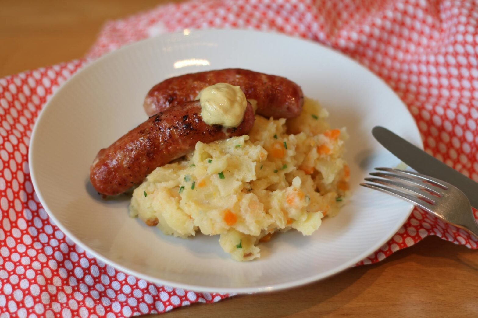 sausage and egg on plate