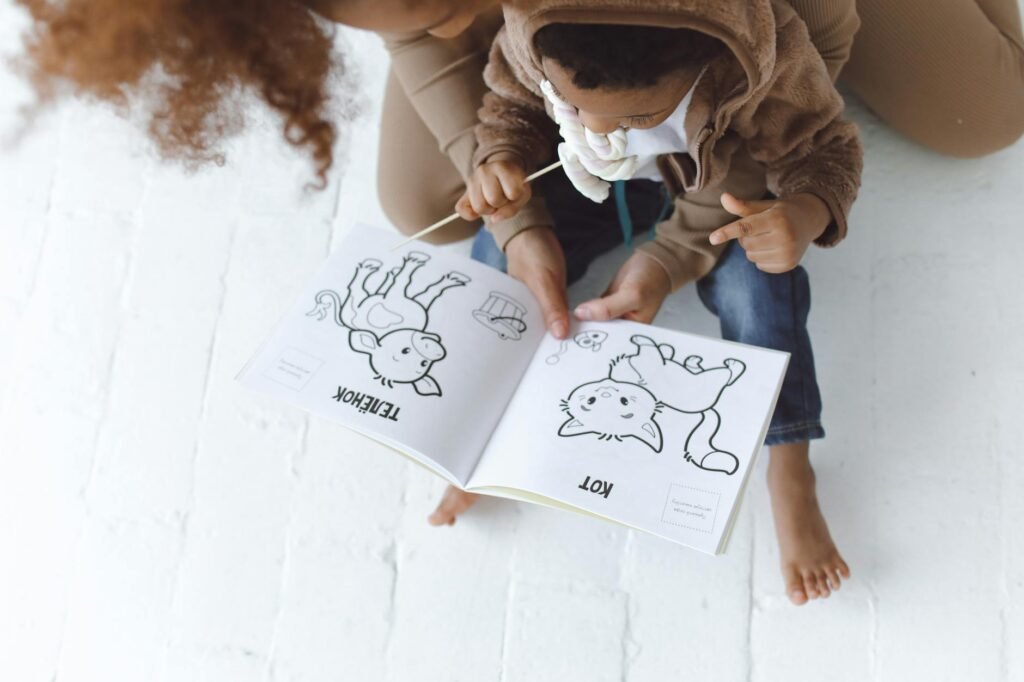 child coloring with mother
